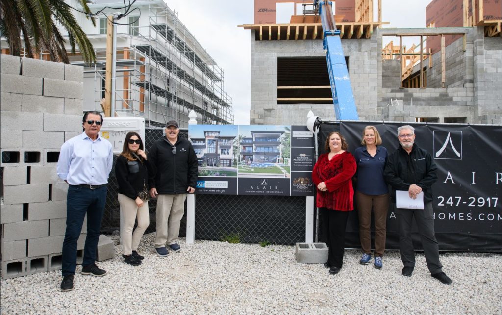 The team in front of the Alair Bonita Springs custom home.