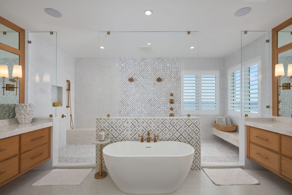 Luxurious spa primary bath featuring an expansive walk-in shower with sleek design.